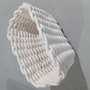 White heavy cord woven basket